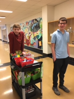 Saline High School Special Ed student working with the snack cart